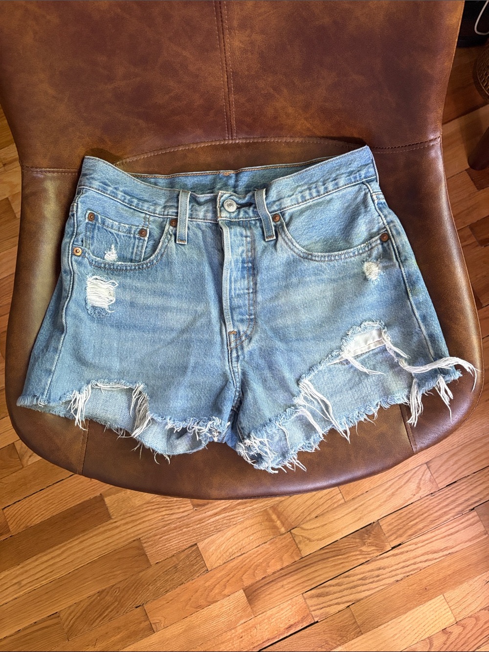 Levi’s:   Light Blue Distressed Denim Shorts - Women